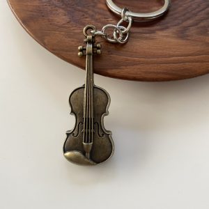 Llaveeo violín color bronce